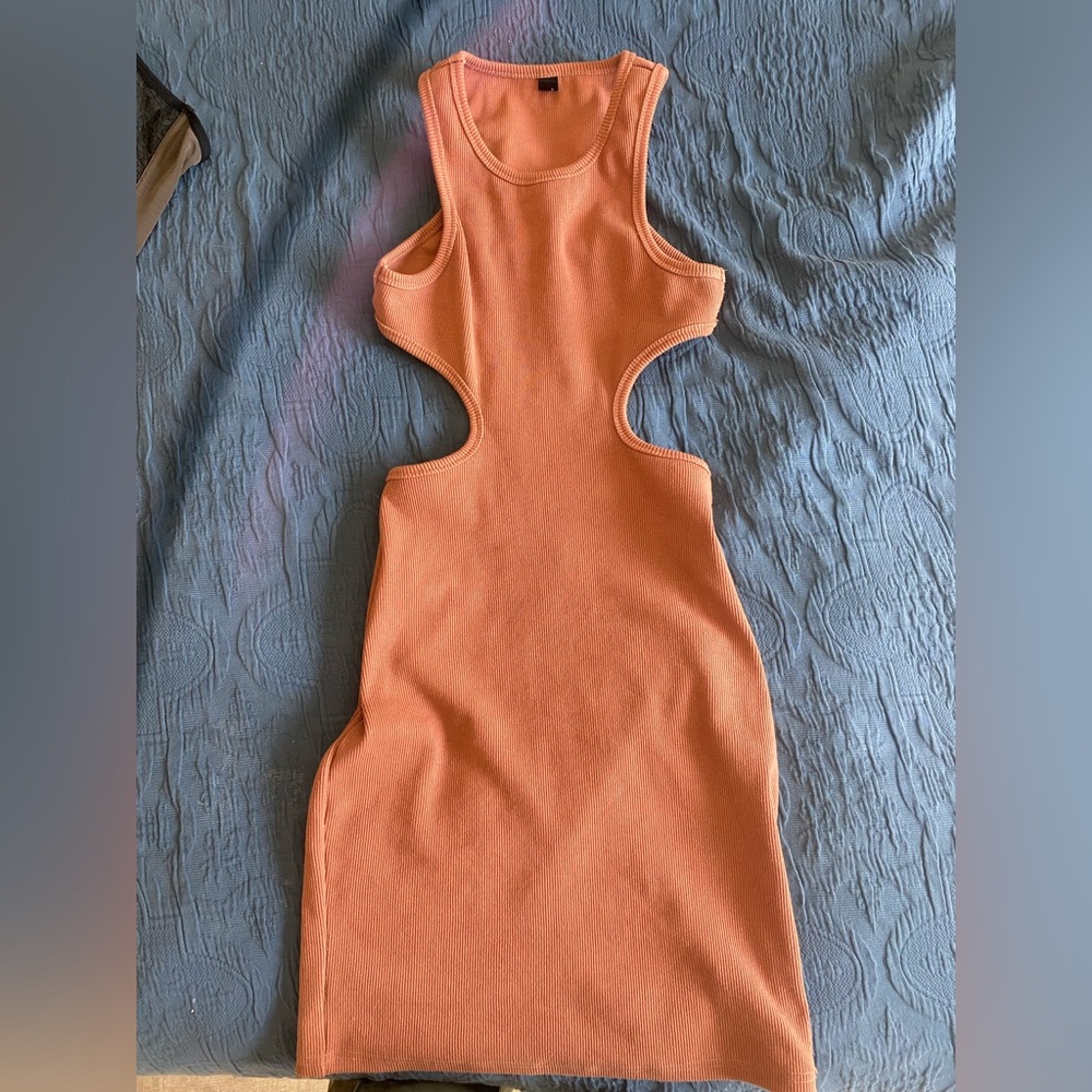Orange/tan. Dress cutout. Slim fitting